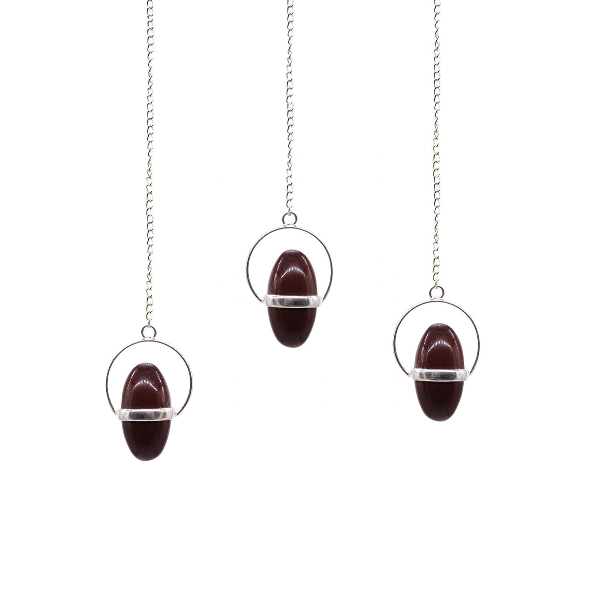 Shiva Lingam con péndulo de banda