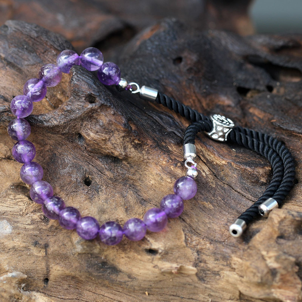 Pulsera de hilo negro de Amatistas